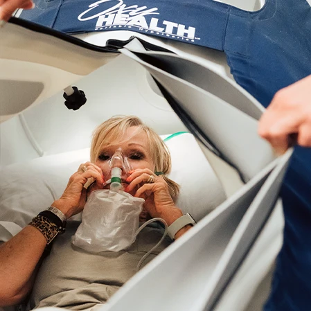 Hyperbaric Clarksville TN Woman Inside Hyperbaric Oxygen Chamber Services